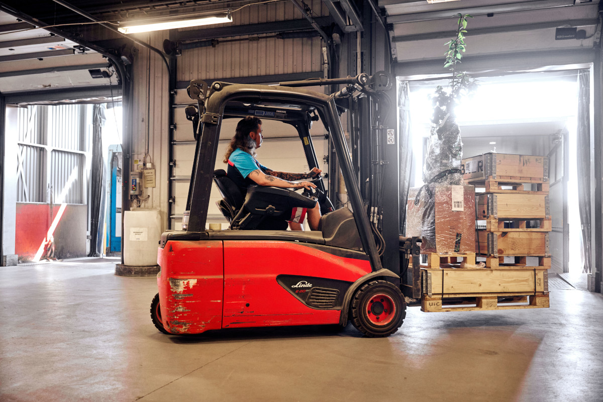 Man driving forklift